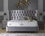 Čalouněná postel MARY s matrací - šedá