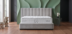 Čalouněná postel WAVE s matrací - šedá